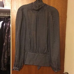 Beautiful silk blouse with an open back